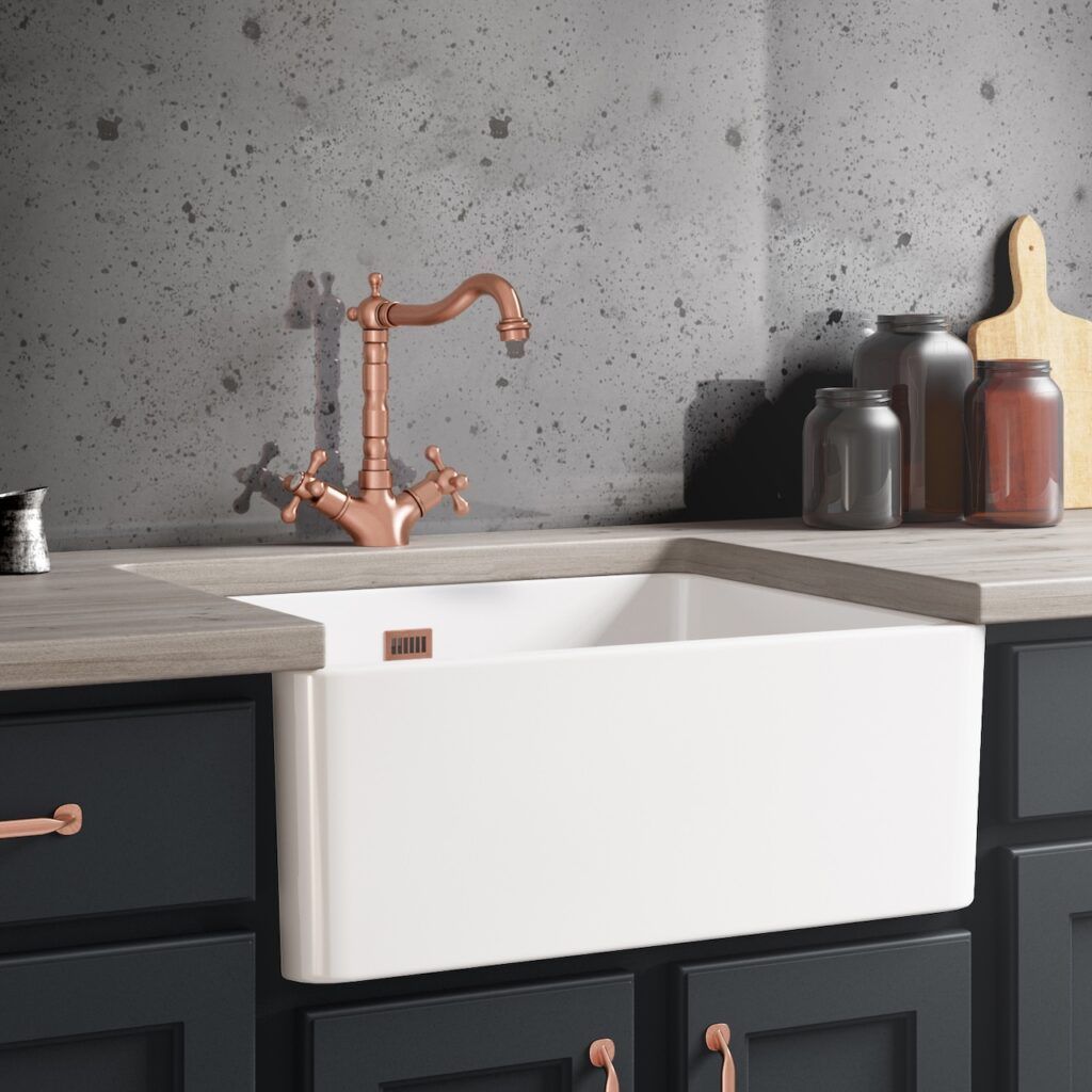 Llave de cocina en cobre antiguo, tendencia metales cálidos 2026